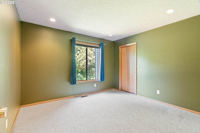 4740 SW Lowell Ct, Portland, OR 97221 - carpeted spare room with recessed lighting and a textured ceiling