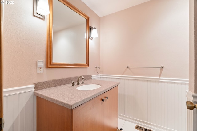 4740 SW Lowell Ct, Portland, OR 97221 - bathroom with wainscoting and vanity