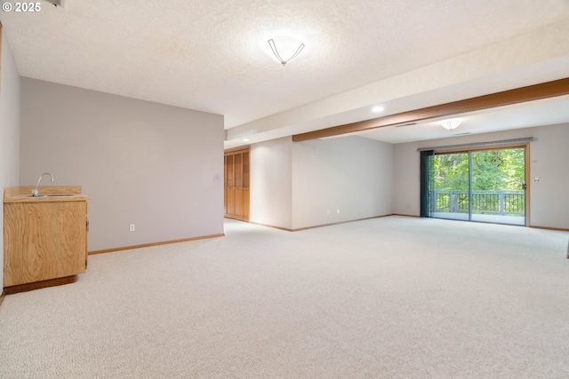 4740 SW Lowell Ct, Portland, OR 97221 - spare room with light carpet, a textured ceiling, and recessed lighting