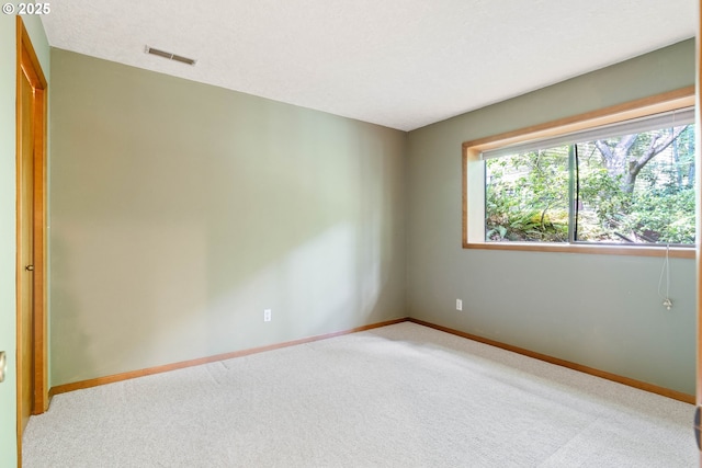 4740 SW Lowell Ct, Portland, OR 97221 - empty room with carpet and baseboards