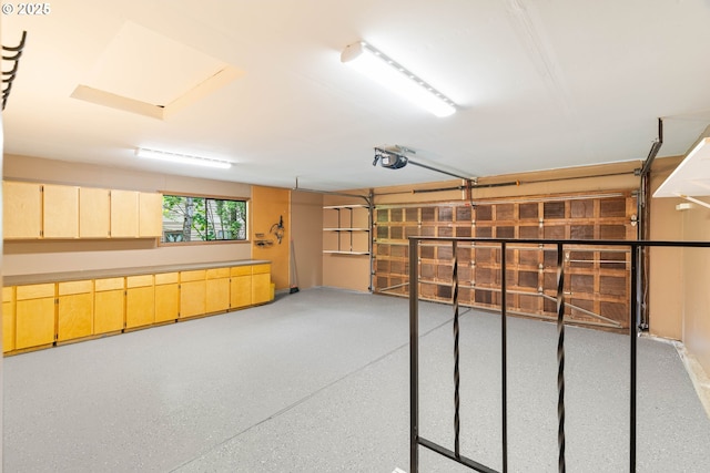4740 SW Lowell Ct, Portland, OR 97221 - garage featuring a garage door opener