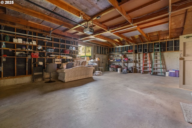 35565 Lower Loop Rd, Pacific City, OR 97135 - garage featuring a garage door opener