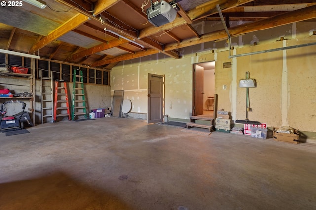 35565 Lower Loop Rd, Pacific City, OR 97135 - garage featuring a garage door opener