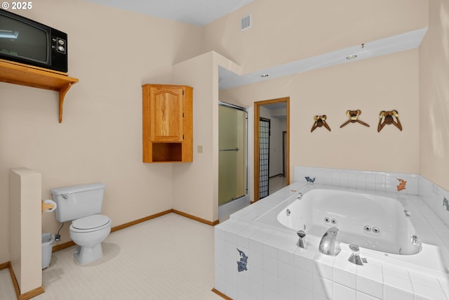 35565 Lower Loop Rd, Pacific City, OR 97135 - bathroom with toilet, a shower stall, a jetted tub, baseboards, and a bidet