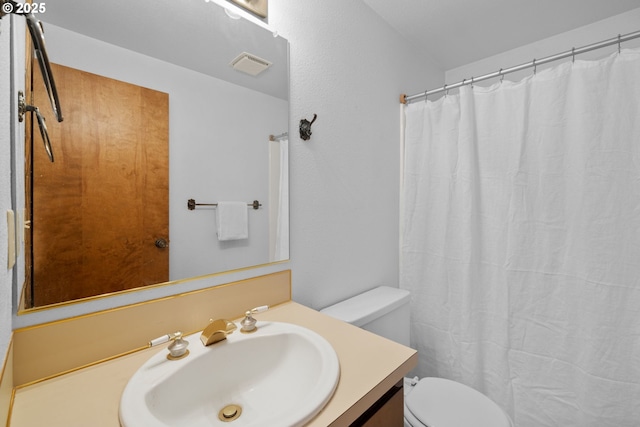 35565 Lower Loop Rd, Pacific City, OR 97135 - bathroom with toilet, vanity, and a shower with shower curtain