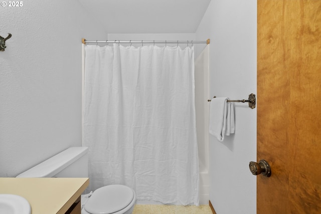 35565 Lower Loop Rd, Pacific City, OR 97135 - bathroom featuring vanity, toilet, and shower / bathtub combination with curtain