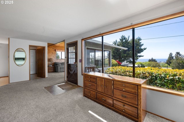 35565 Lower Loop Rd, Pacific City, OR 97135 - carpeted bedroom with wooden walls