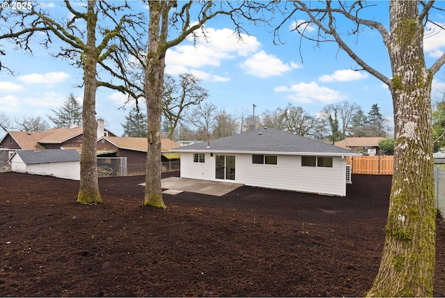 rear view of property with a patio