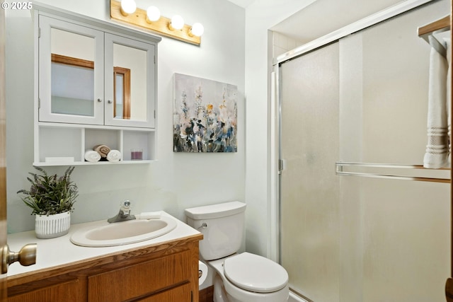16146 SW 130th Ter Unit 2, Portland, OR 97224 - bathroom with a stall shower, toilet, and vanity