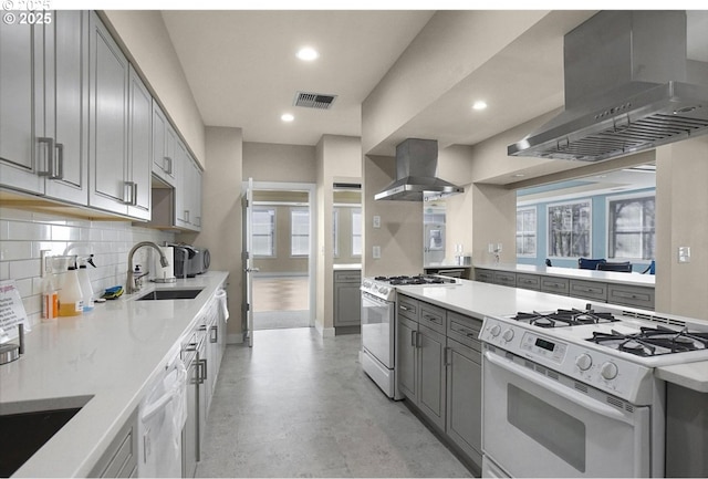 16146 SW 130th Ter Unit 2, Portland, OR 97224 - kitchen with white appliances, wall chimney range hood, a sink, gray cabinets, and recessed lighting