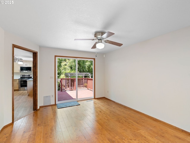 8275 SW Chestnut St, Portland, OR 97223 - unfurnished room with light wood finished floors and ceiling fan
