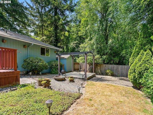 8275 SW Chestnut St, Portland, OR 97223 - fenced backyard with a storage shed and a patio area