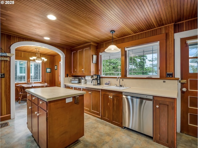 1021 S Prom, Seaside, OR 97138 - kitchen with dishwasher, a chandelier, a sink, wood ceiling, and brown cabinets