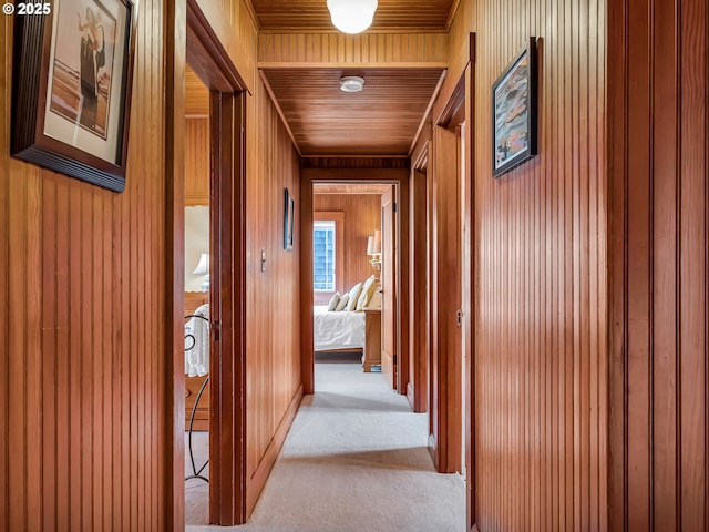 1021 S Prom, Seaside, OR 97138 - hall featuring carpet floors and wooden walls