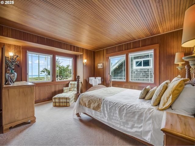 1021 S Prom, Seaside, OR 97138 - carpeted bedroom featuring wooden ceiling and wood walls