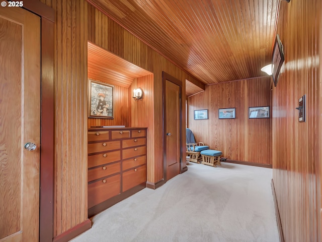 1021 S Prom, Seaside, OR 97138 - hall with wood walls, wood ceiling, and carpet flooring
