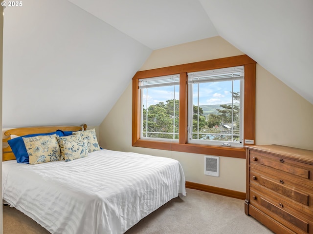 1021 S Prom, Seaside, OR 97138 - bedroom featuring lofted ceiling, light colored carpet, multiple windows, baseboards, and heating unit