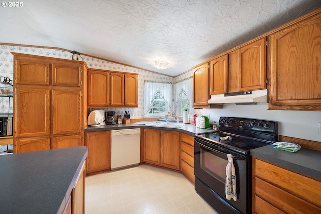 kitchen with brown cabinets, dishwasher, wallpapered walls, under cabinet range hood, and black range with electric stovetop
