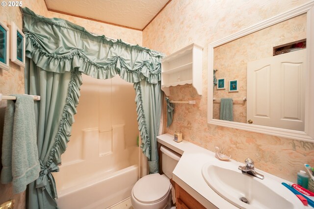 bathroom with shower / bath combo with shower curtain, wallpapered walls, toilet, and vanity