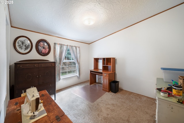 carpeted office featuring a textured ceiling, vaulted ceiling, and ornamental molding