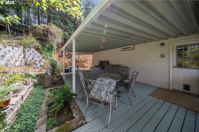 deck featuring outdoor dining area