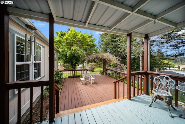 deck with outdoor dining space