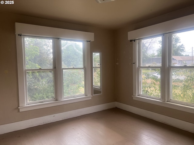 103 NW 10th Ave, Milton-Freewater, OR 97862 - spare room featuring wood finished floors and baseboards