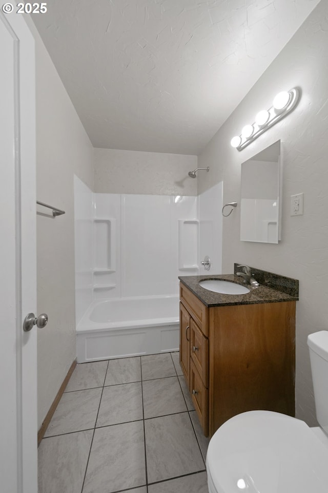 full bathroom with tile patterned floors, vanity, toilet, and shower / bath combination