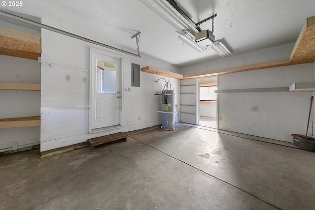 garage with a garage door opener, electric panel, and water heater