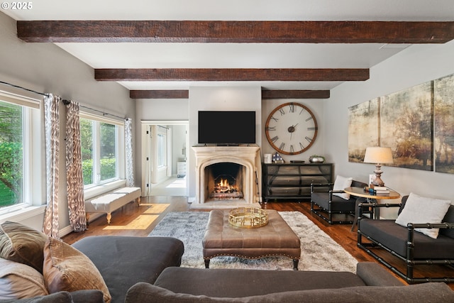 10205 NE 110th Cir, Vancouver, WA 98662 - living area with beamed ceiling, wood finished floors, and a lit fireplace