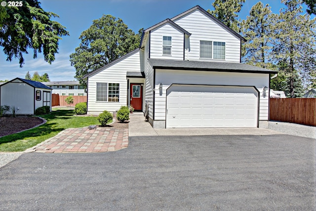 425 Warner St, Oregon City, OR 97045 - view of front of property with asphalt driveway, an attached garage, and an outdoor structure