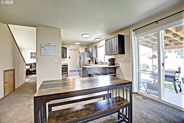 425 Warner St, Oregon City, OR 97045 - dining space with light colored carpet and a textured ceiling