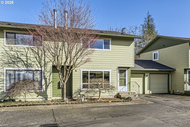 view of front of property with a garage