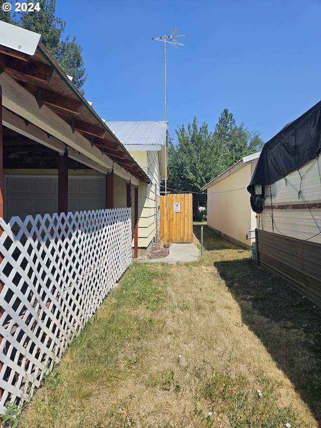 view of yard featuring a garage