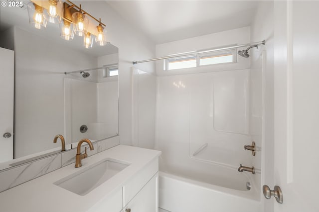 full bath featuring vanity and shower / bathing tub combination