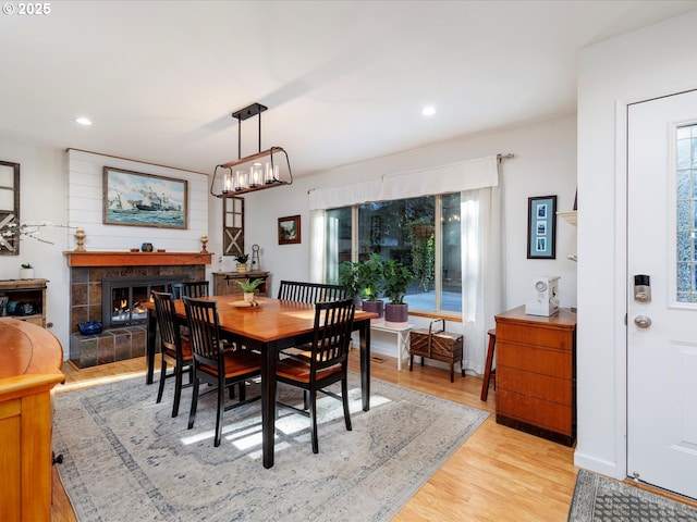 18495 Terry Ave, Lake Oswego, OR 97035 - dining space featuring recessed lighting, light wood-style flooring, and a fireplace