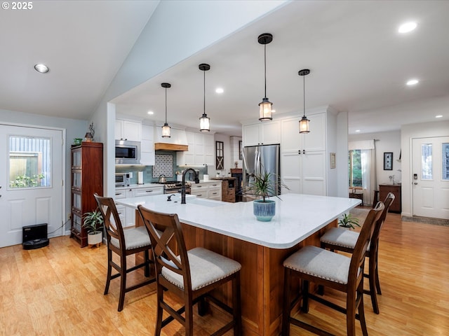 18495 Terry Ave, Lake Oswego, OR 97035 - kitchen with recessed lighting, appliances with stainless steel finishes, and plenty of natural light