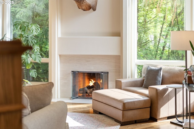 9030 SW Lancelot Ln, Portland, OR 97219 - living area with wood finished floors and a high end fireplace