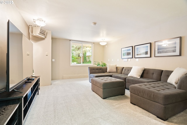 living room with carpet floors and an AC wall unit