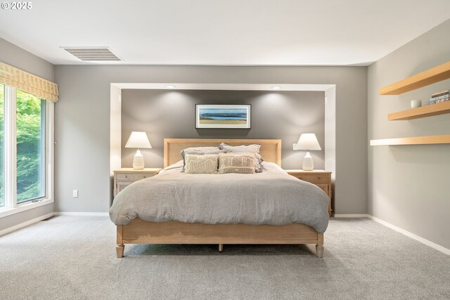 9030 SW Lancelot Ln, Portland, OR 97219 - bedroom with carpet floors, multiple windows, and baseboards