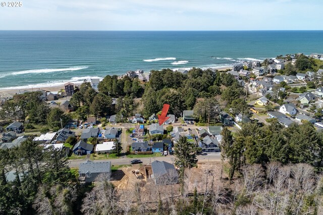 2950 SW Beach Ave, Lincoln City, OR 97367 - drone / aerial view with a water view and a residential view