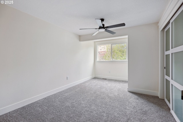 8616 SW 49th Ave, Portland, OR 97219 - carpeted empty room featuring a ceiling fan and baseboards