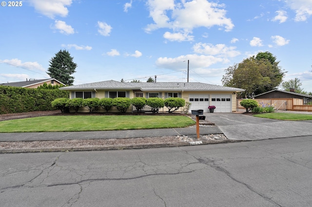 17725 NE Multnomah Dr, Portland, OR 97230 - single story home featuring driveway, an attached garage, and a front lawn