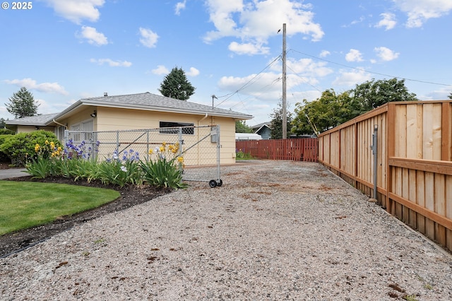 17725 NE Multnomah Dr, Portland, OR 97230 - view of side of property featuring a shingled roof