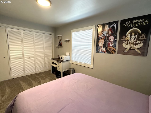 bedroom with dark colored carpet