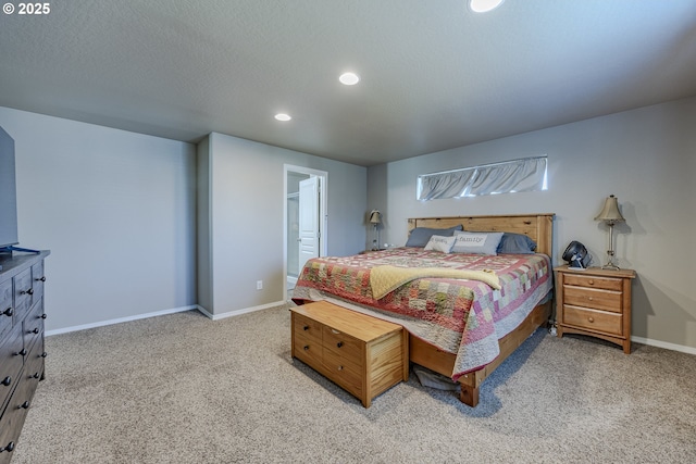 carpeted bedroom with a textured ceiling, recessed lighting, and baseboards