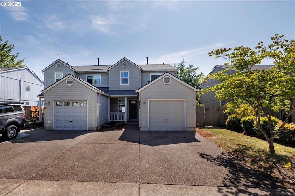 2570 NE 1st Dr, Hillsboro, OR 97124 - traditional home featuring driveway and a garage