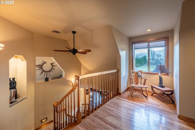 interior space with wood finished floors, baseboards, visible vents, ceiling fan, and recessed lighting