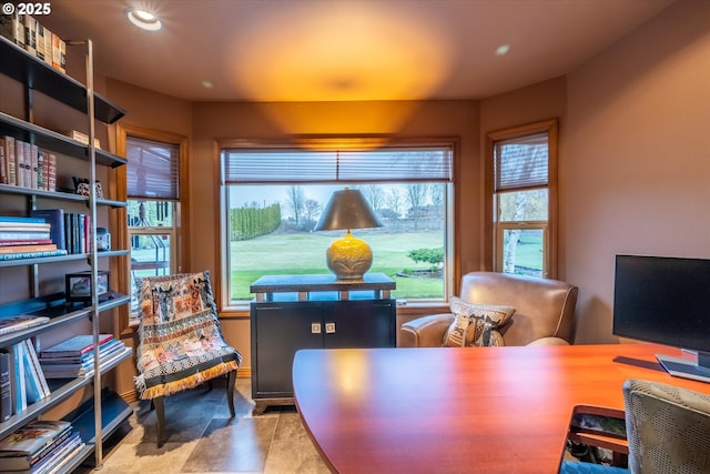 office space with baseboards and recessed lighting