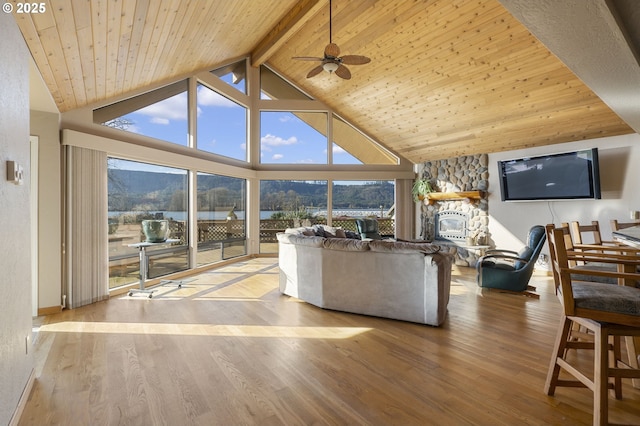 285 W Sunny Sands Rd, Cathlamet, WA 98612 - living area featuring wood finished floors, a ceiling fan, beamed ceiling, wood ceiling, and high vaulted ceiling